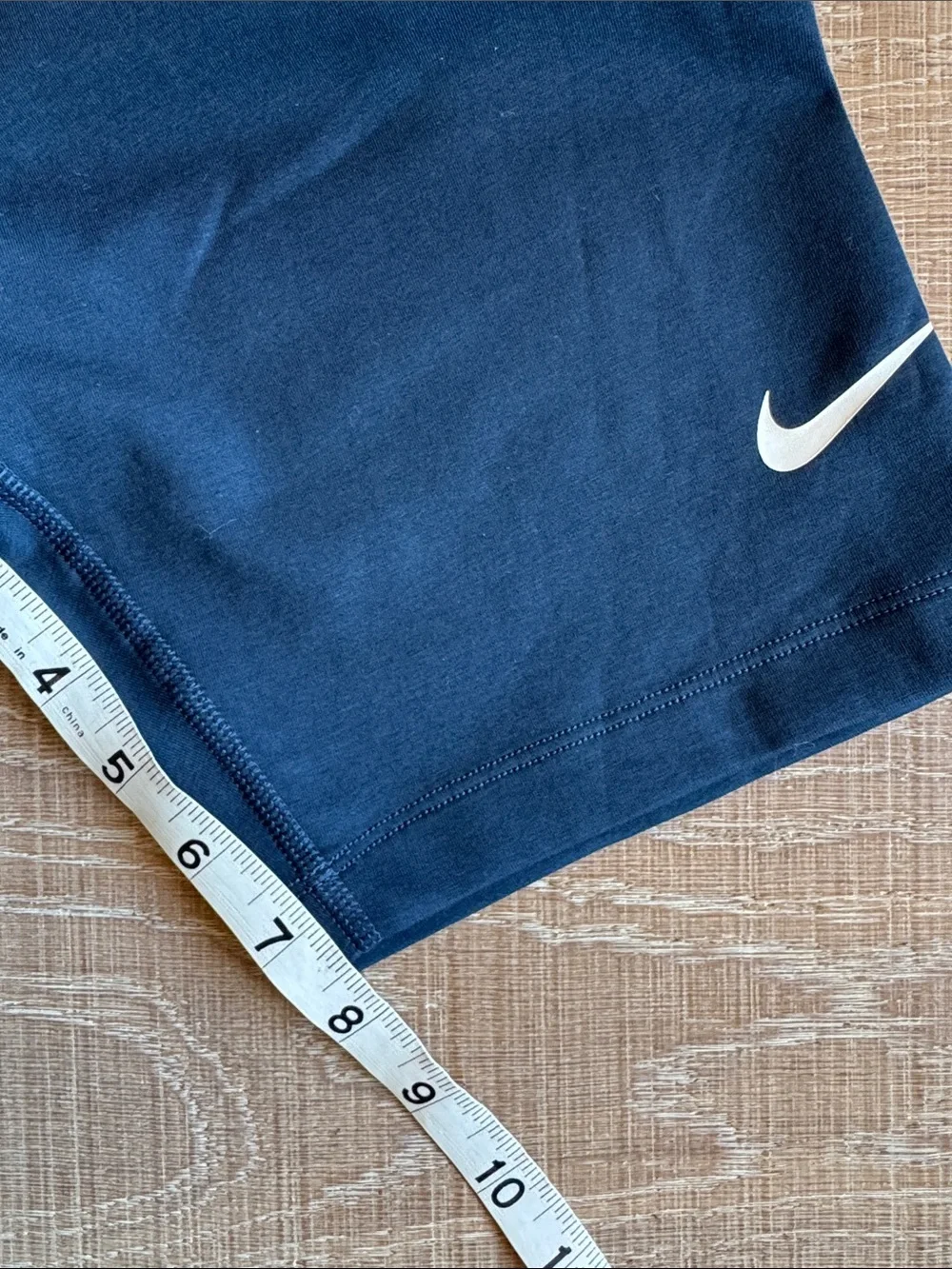 Nike women’s Marine Blue Bike Shorts with White Swoosh NWOT M